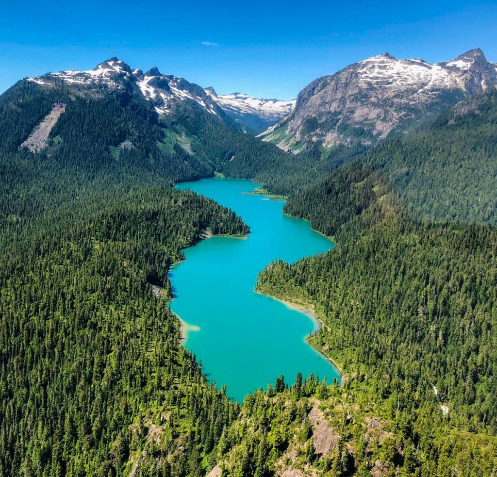 View looking west over Phantom Lake as passengers approach for landing in the seaplane with Sea To Sky Air